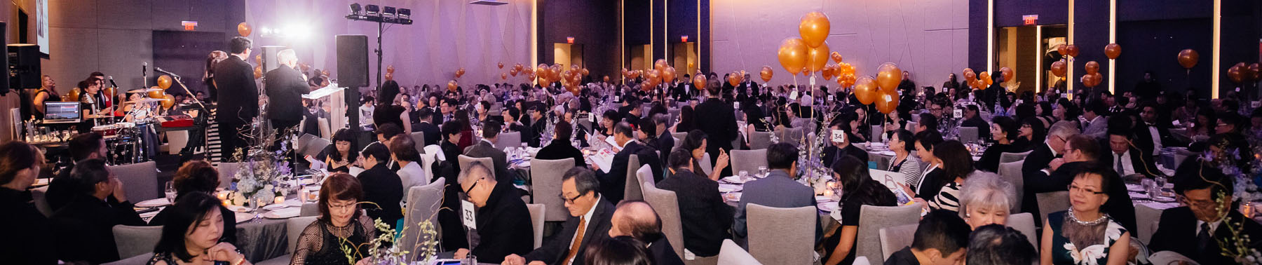 A view of the reception room of the Vancouver Gala with packed tables