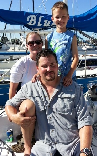 Lorraine, her husband Ken, and their son Zac.