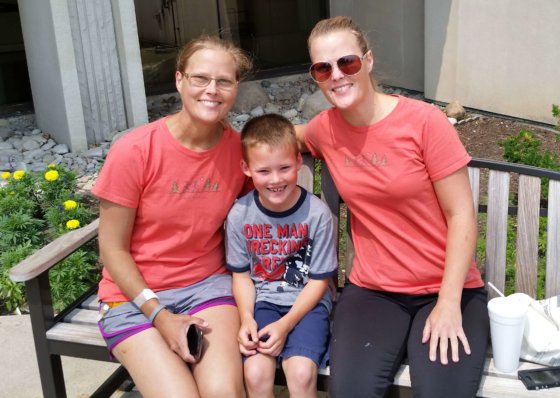 (Left to Right) Lorraine, Zac and Connie seated on a park bench. Lorraine dianogsed with Primary Sclerosing Cholangitis (PSC), was given a second chance at life after a liver transplant by her twin sister, Connie