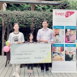 Little heroes birthday party: family presenting cheque for CLF