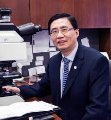 Photo of Dr.Zu at the office